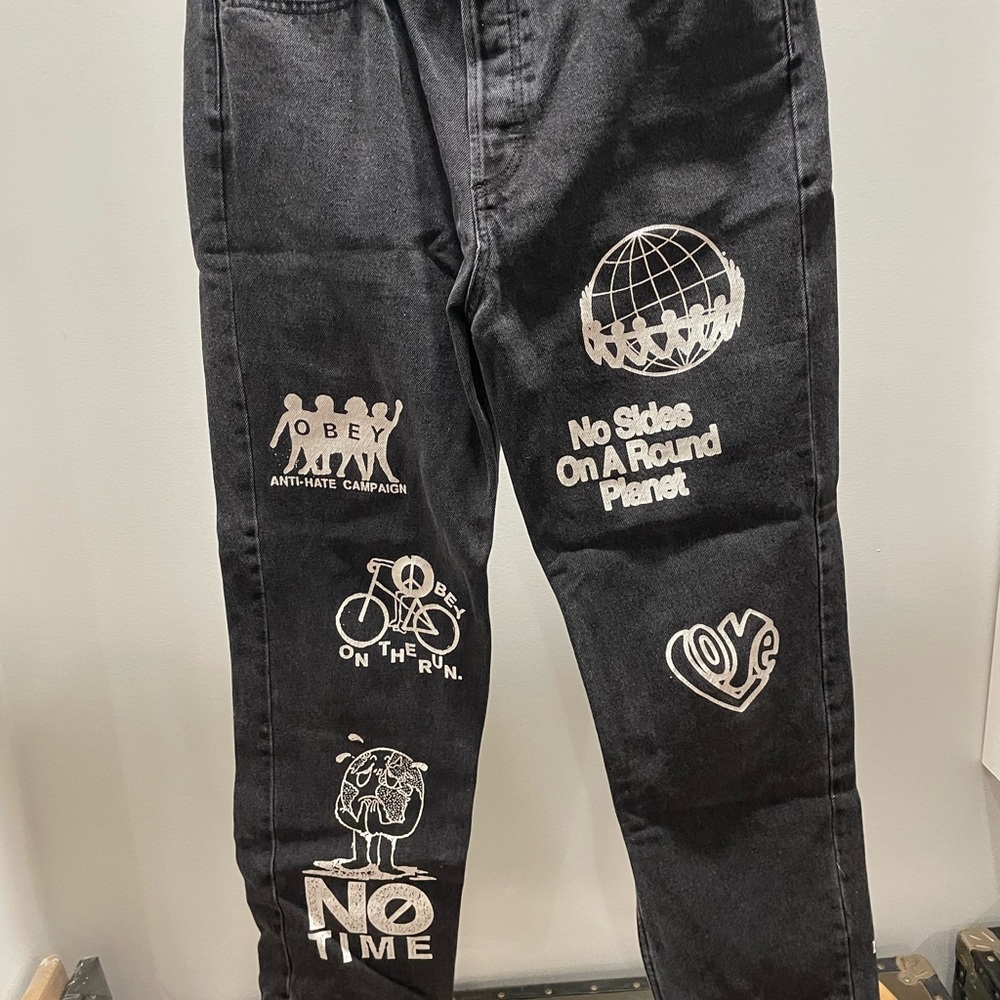 Obey Black Washed Denim Jeans with white prints and Metal Logo Button